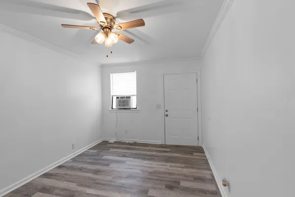 a view of an empty room with a window