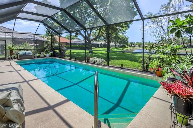 9871 Rookery Circle Estero, FL 33928 - Photo 24 of 38 a view of a backyard