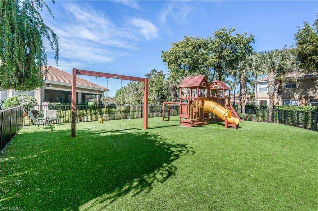 9871 Rookery Circle Estero, FL 33928 - Photo 30 of 33 a view of a park with slide