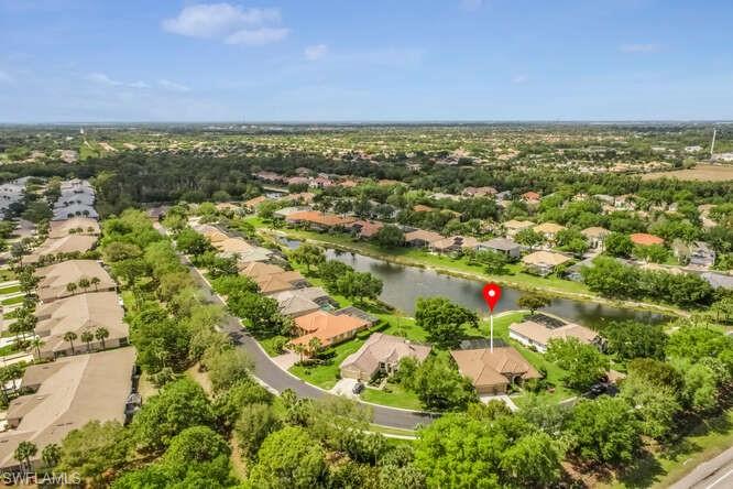 9871 Rookery Circle Estero, FL 33928 - Photo 3 of 38 view of city and green space