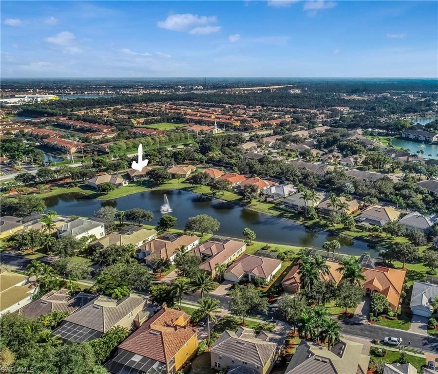 9871 Rookery Circle Estero, FL 33928 - Photo 4 of 33 an aerial view of a residential houses with outdoor space and lake view