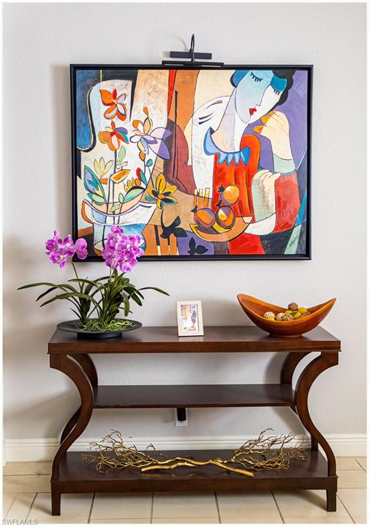 9871 Rookery Circle Estero, FL 33928 - Photo 6 of 33 a room with toys and wooden floor