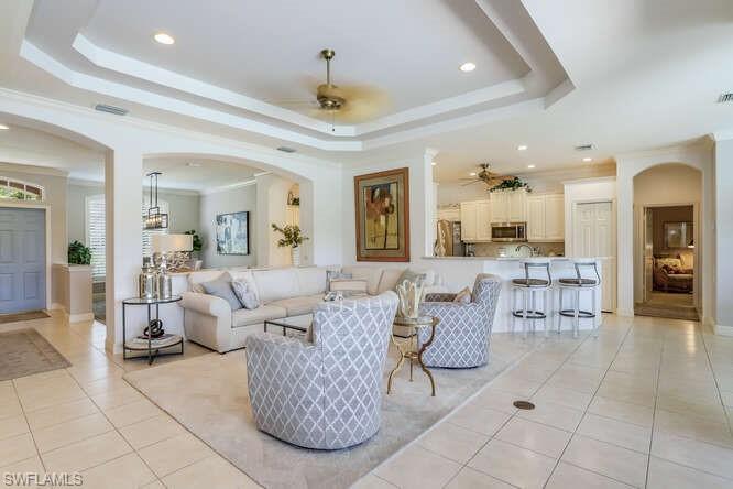 9871 Rookery Circle Estero, FL 33928 - Photo 10 of 38 a living room with furniture and a dining table