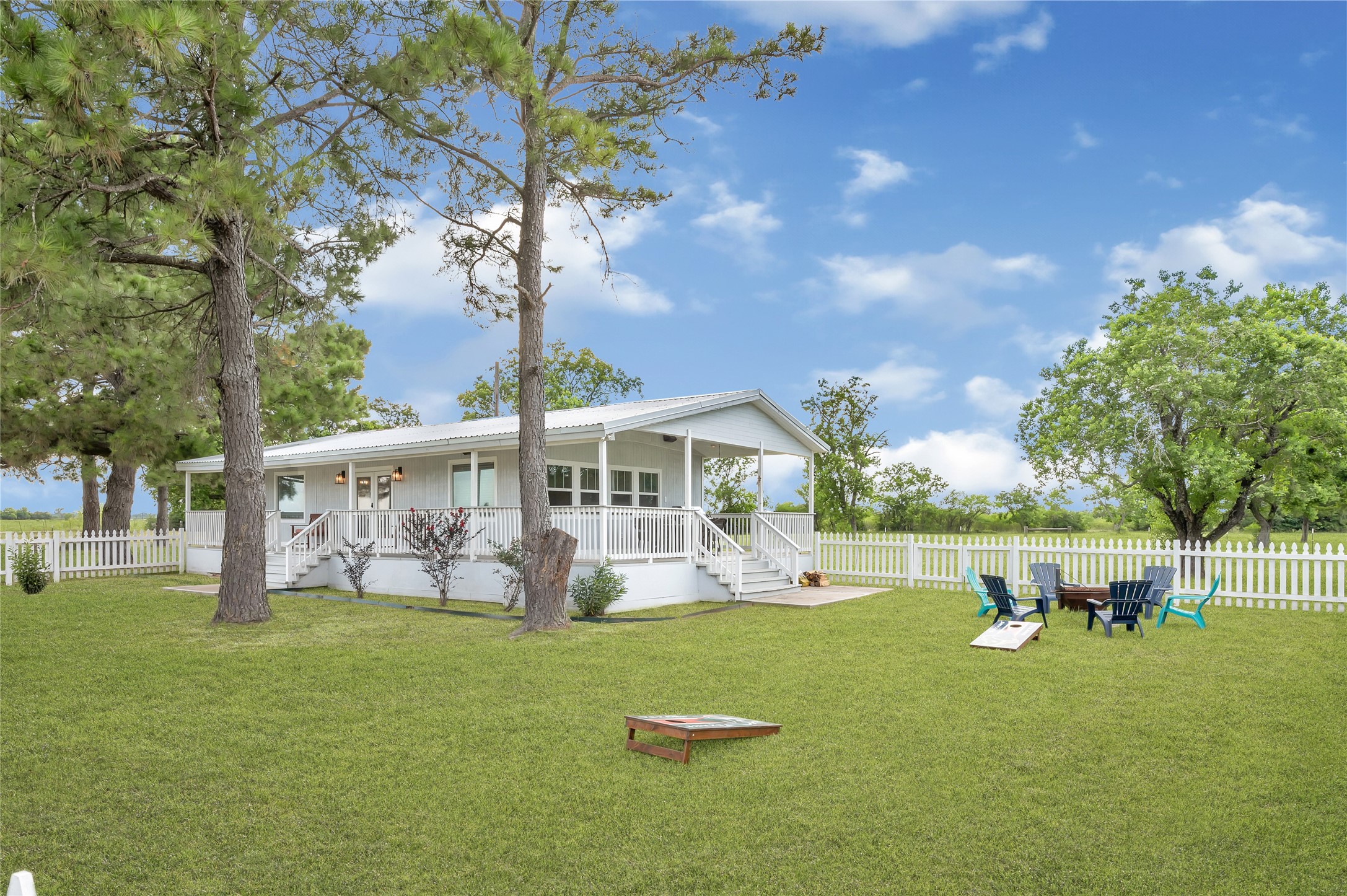 868 Lisa May Road Bellville, TX 77418 - Photo 13 of 39 a view of a house with a big yard