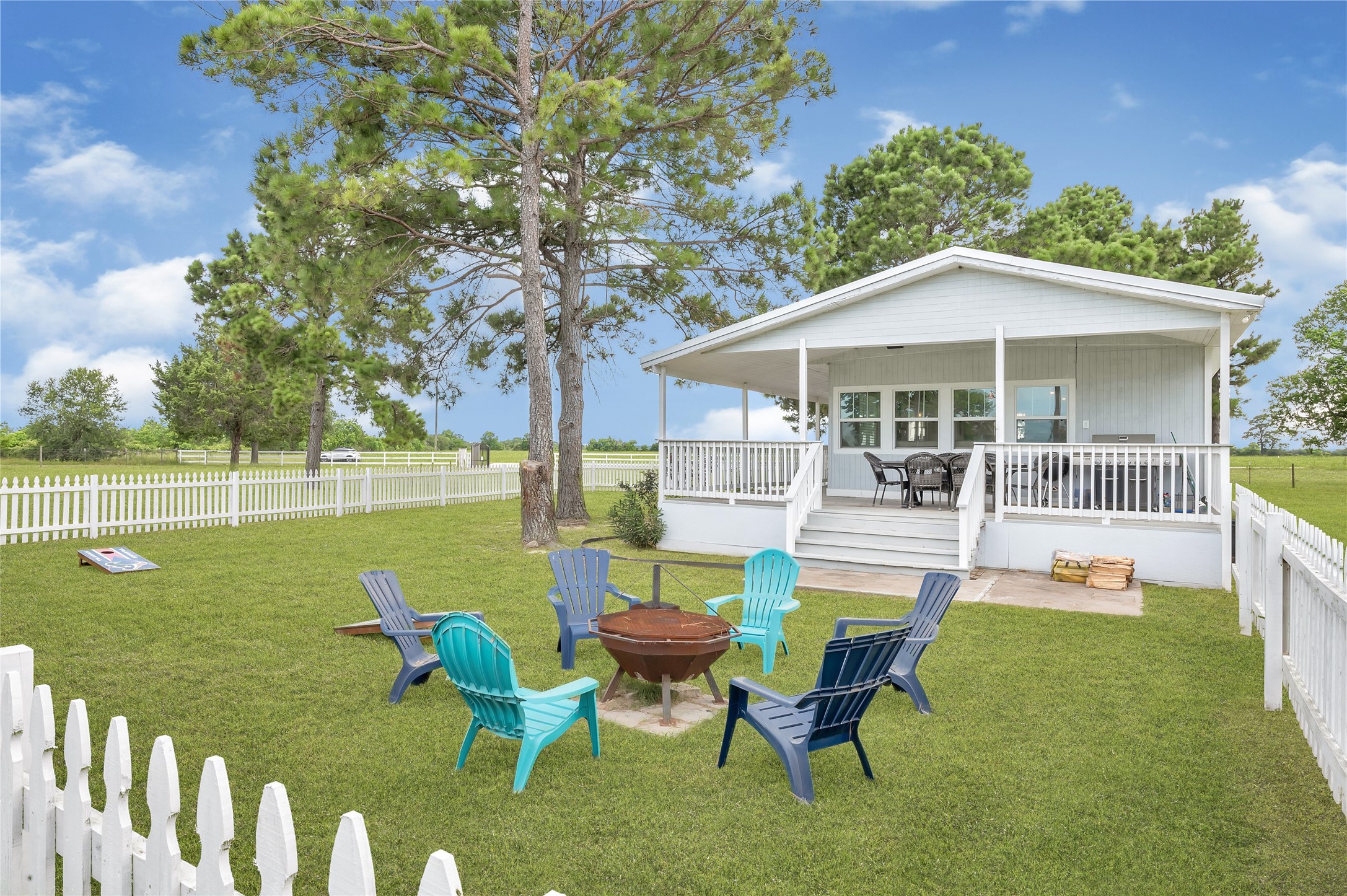 868 Lisa May Road Bellville, TX 77418 - Photo 14 of 39 a view of a house with a yard patio and swimming pool