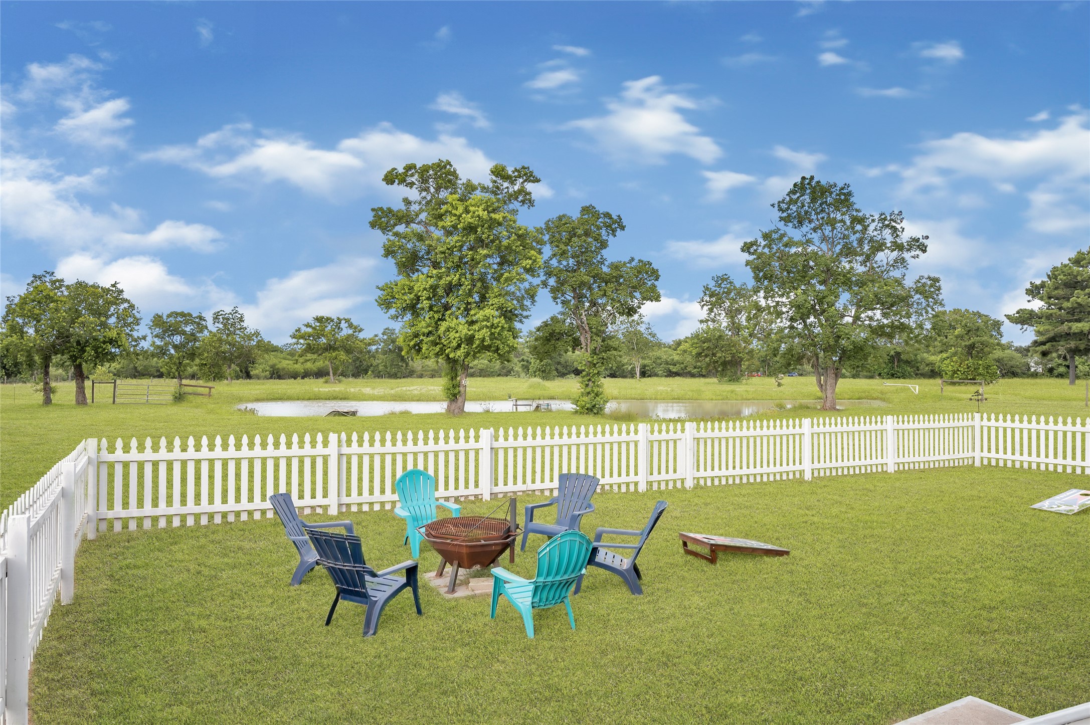 868 Lisa May Road Bellville, TX 77418 - Photo 16 of 39 a view of a lake with a deck