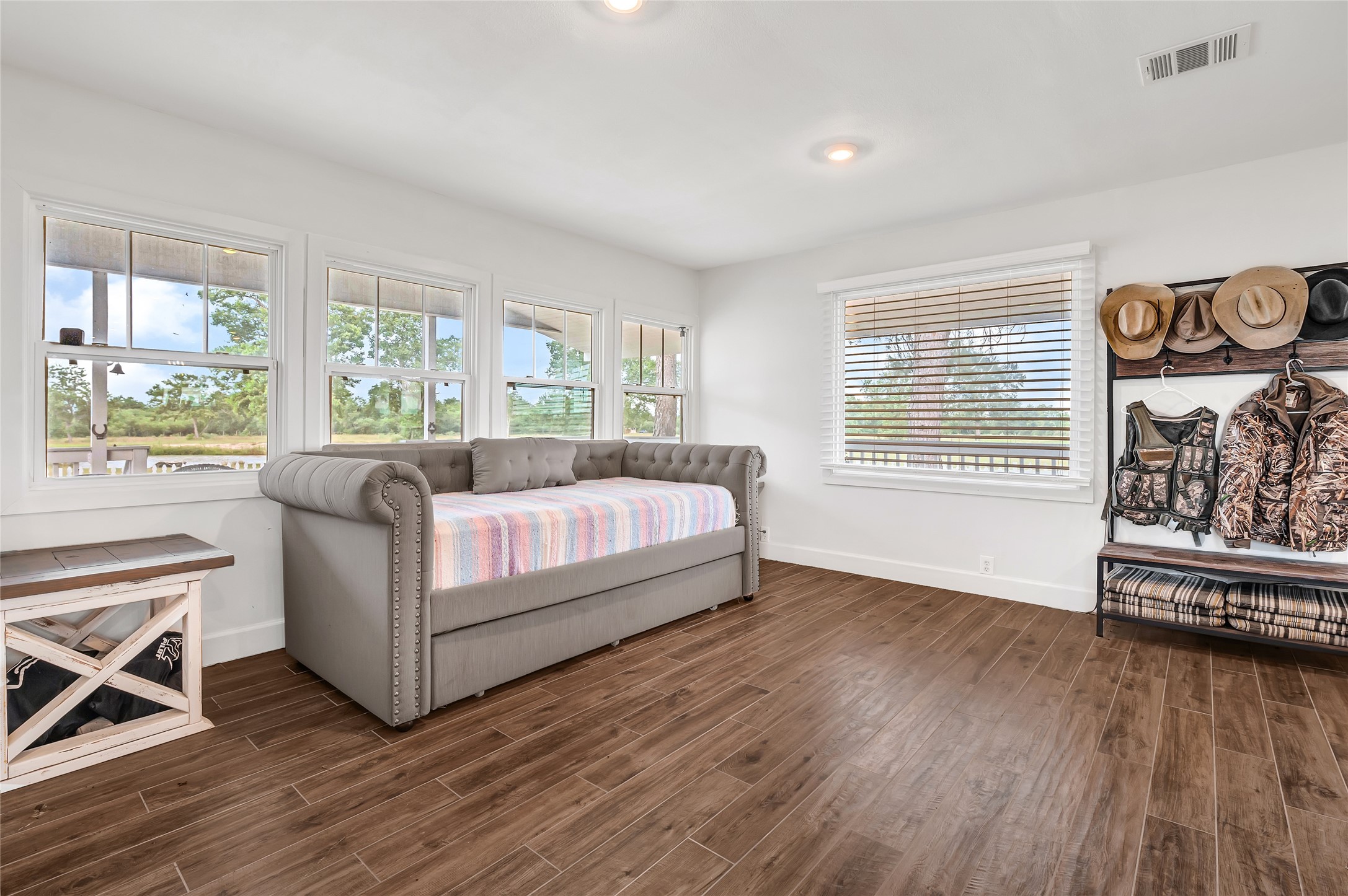 868 Lisa May Road Bellville, TX 77418 - Photo 27 of 39 a living room with a bed furniture and a window
