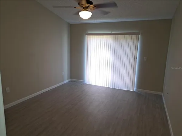 an empty room that has a window