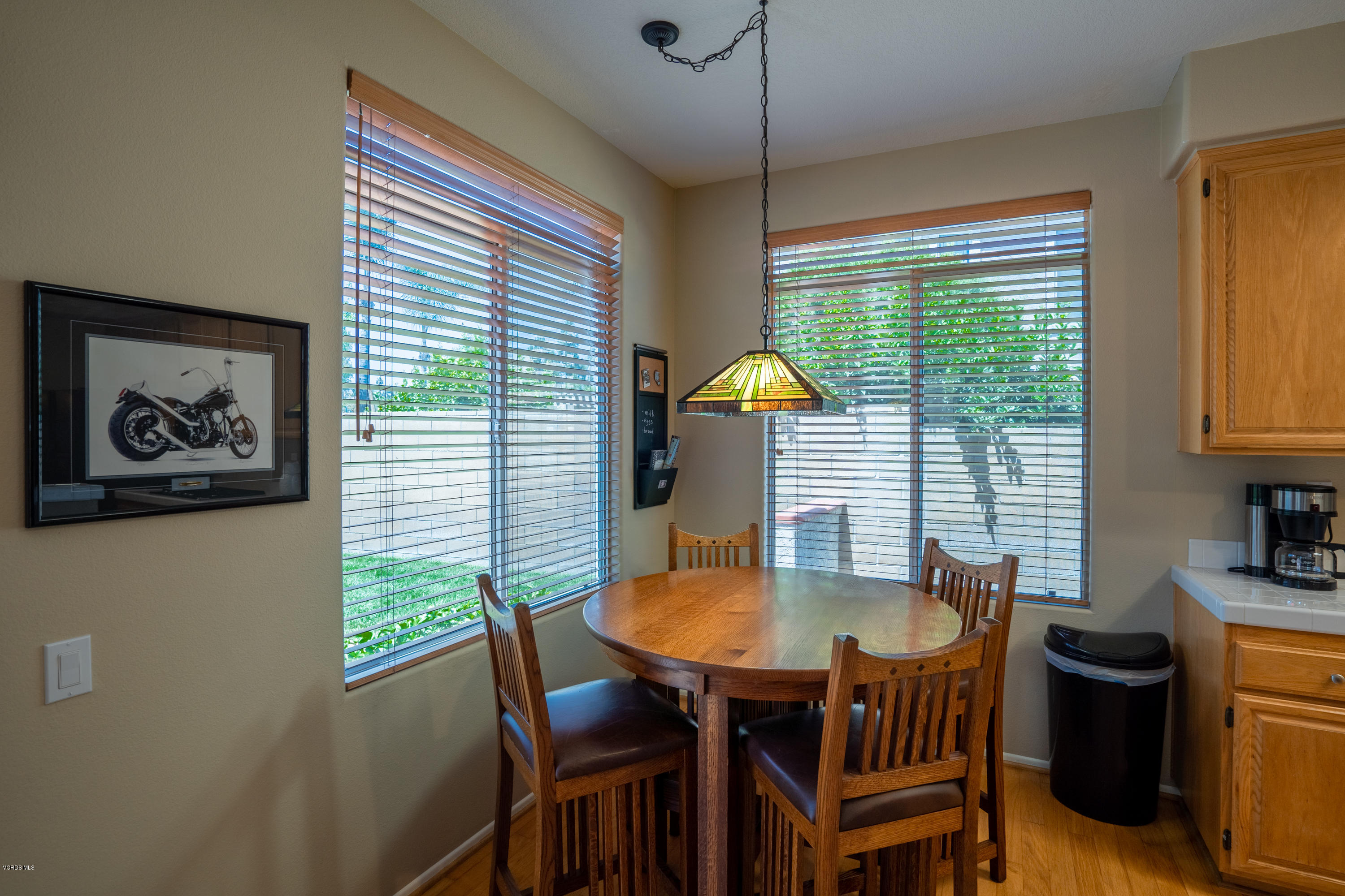 3931 Sunsetridge Road Moorpark, CA 93021 - Photo 15 of 36 a view of a dining room with furniture window and outside view