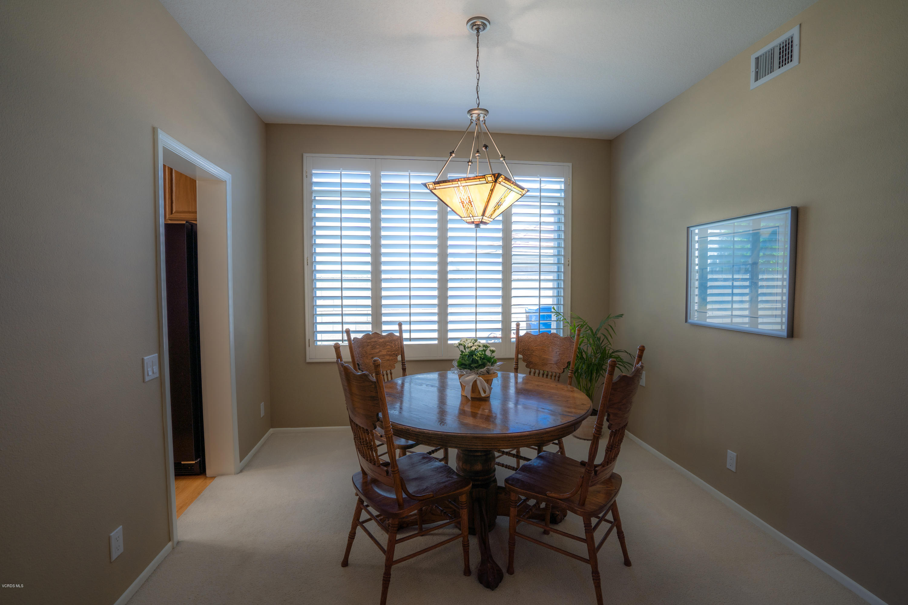 3931 Sunsetridge Road Moorpark, CA 93021 - Photo 16 of 36 a dining room with furniture and window