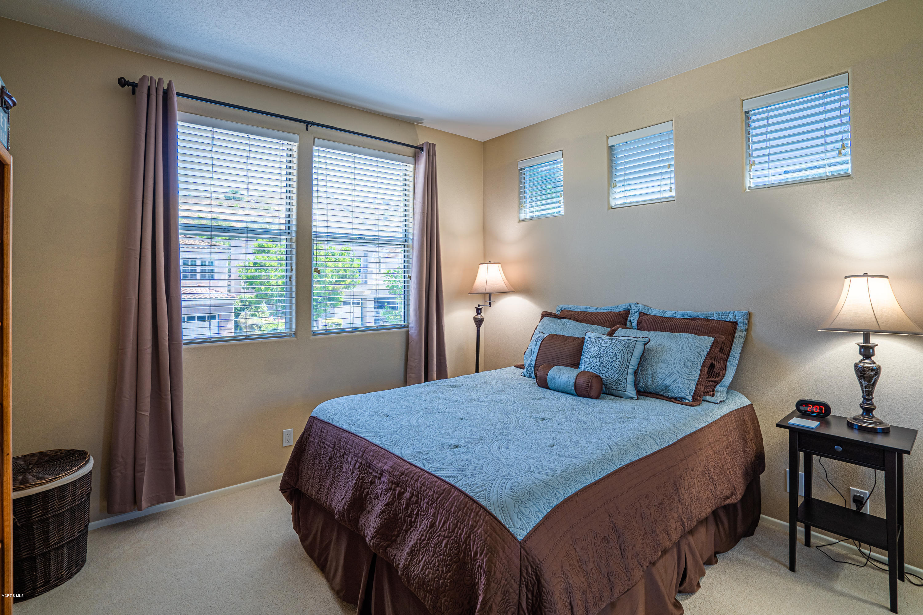 3931 Sunsetridge Road Moorpark, CA 93021 - Photo 20 of 36 a bed sitting in a bedroom next to a window