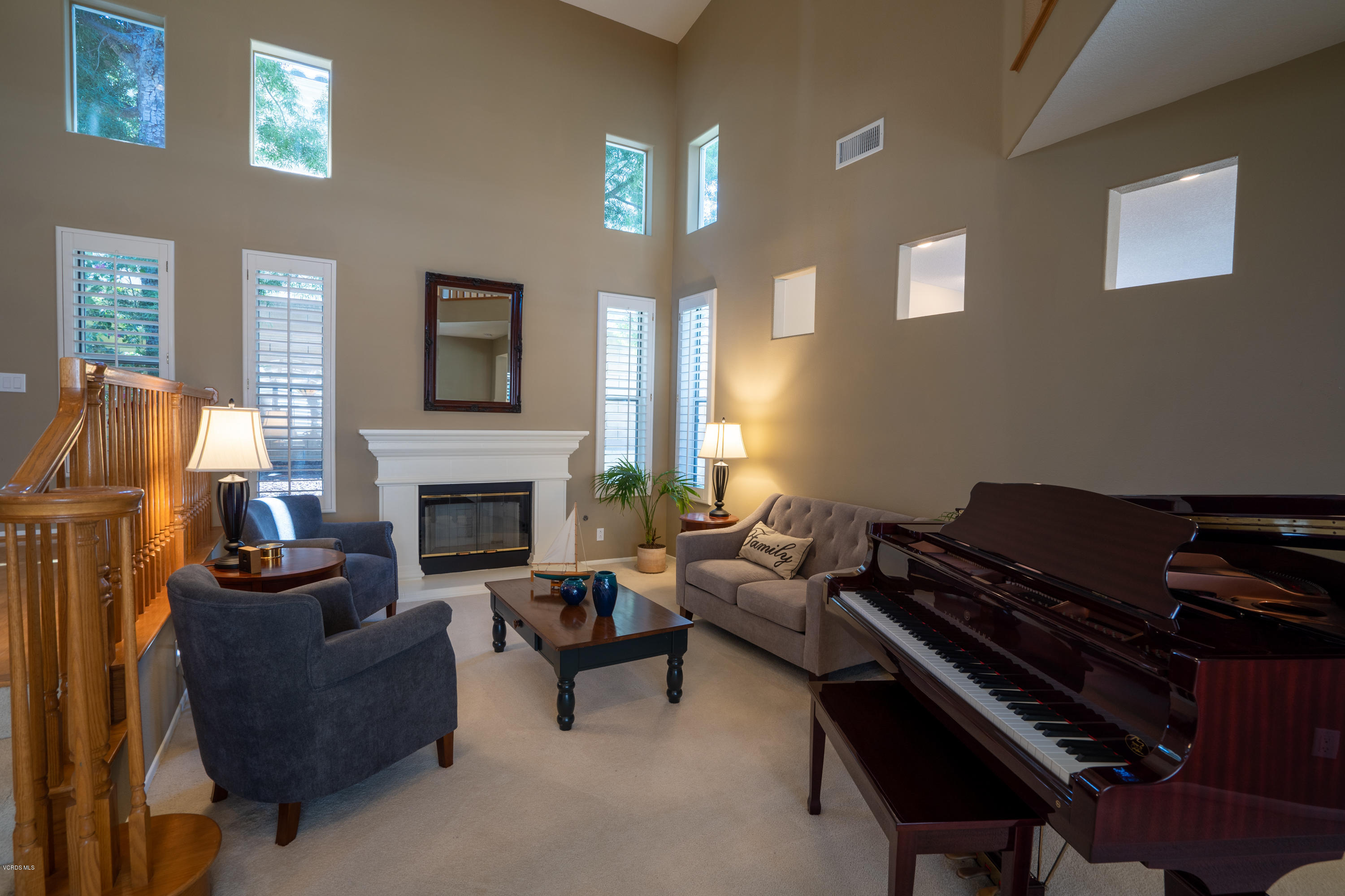 3931 Sunsetridge Road Moorpark, CA 93021 - Photo 5 of 36 a living room with furniture fireplace and a large window