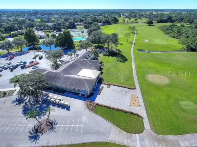 an aerial view of a house with a garden