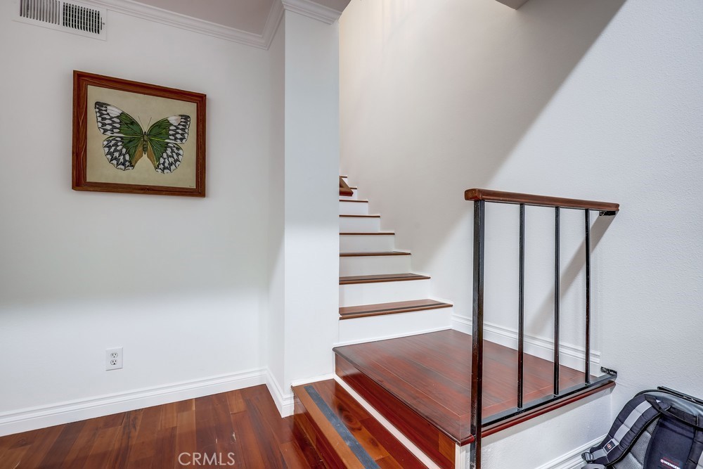 9678 Walker Court Cypress, CA 90630 - Photo 18 of 40 a view of entryway with wooden floor