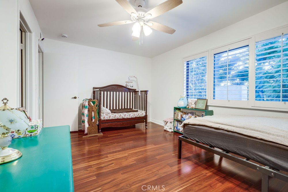 9678 Walker Court Cypress, CA 90630 - Photo 20 of 40 a living room with furniture and a wooden floor