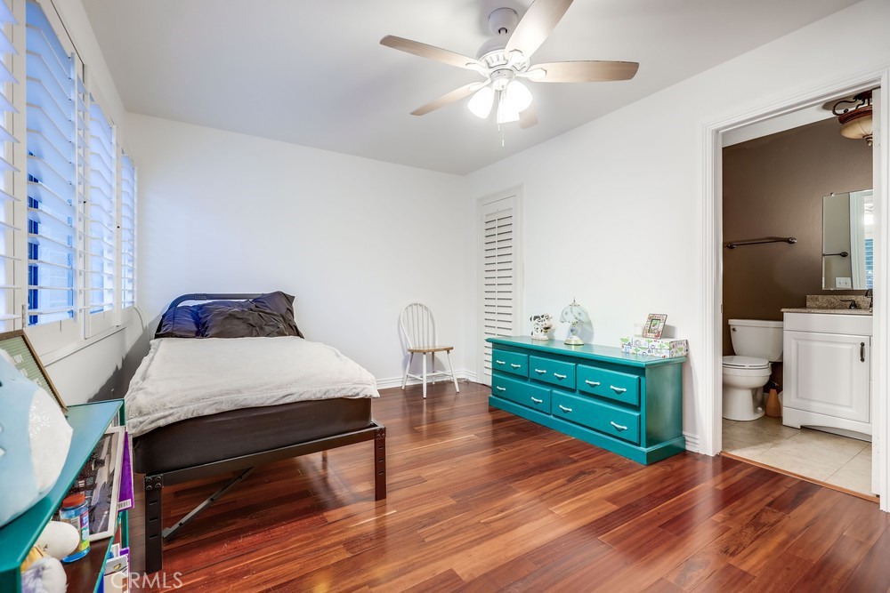 9678 Walker Court Cypress, CA 90630 - Photo 22 of 40 a living room with furniture and a wooden floor