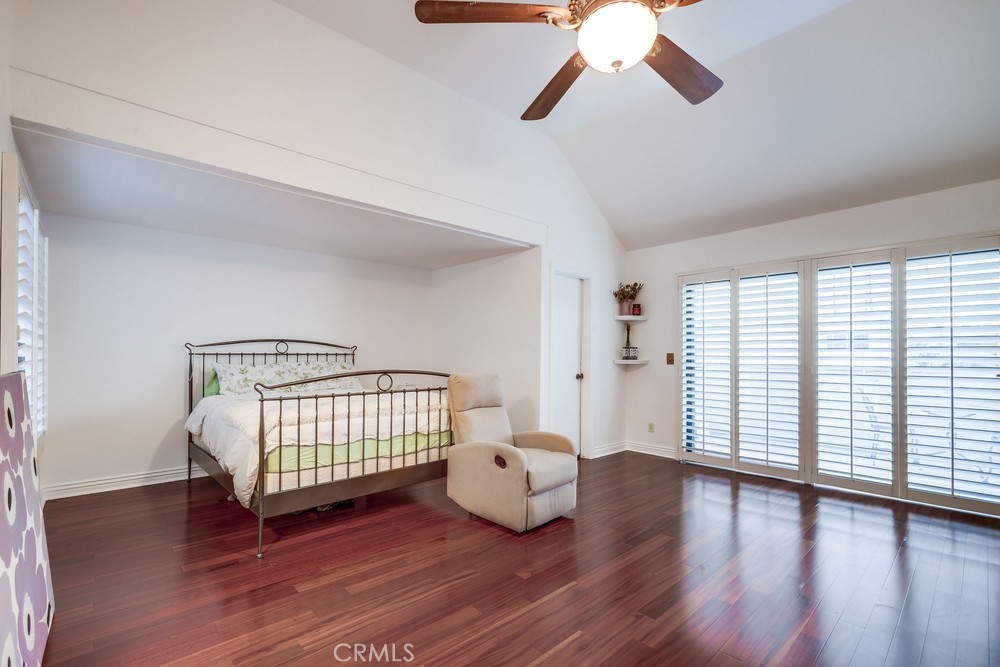 9678 Walker Court Cypress, CA 90630 - Photo 24 of 40 a room with wooden floor and windows