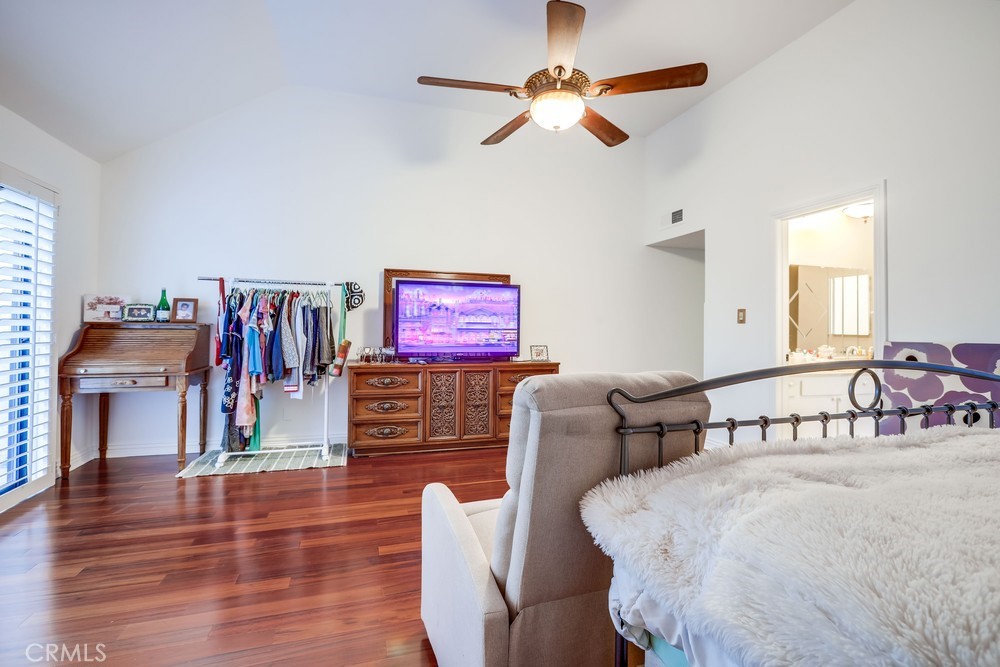 9678 Walker Court Cypress, CA 90630 - Photo 27 of 40 a bedroom with furniture and a flat screen tv