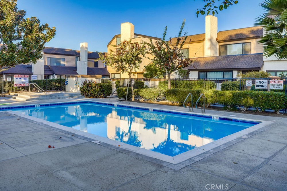 9678 Walker Court Cypress, CA 90630 - Photo 36 of 40 a view of a swimming pool with a patio