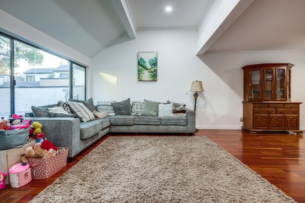 9678 Walker Court Cypress, CA 90630 - Photo 4 of 40 a living room with furniture and wooden floor