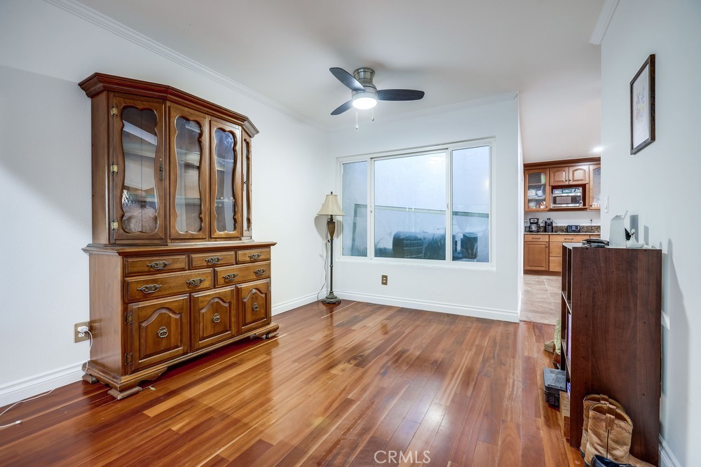 9678 Walker Court Cypress, CA 90630 - Photo 10 of 40 a view of a bedroom with furniture and windows