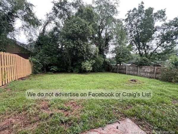 a view of a garden with basketball court