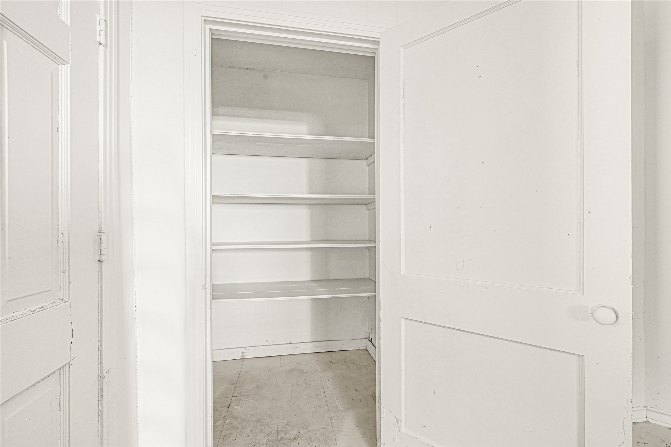 1202 North Roberson Street Conroe, TX 77301 - Photo 17 of 50 Pantry/storage closet with shelving