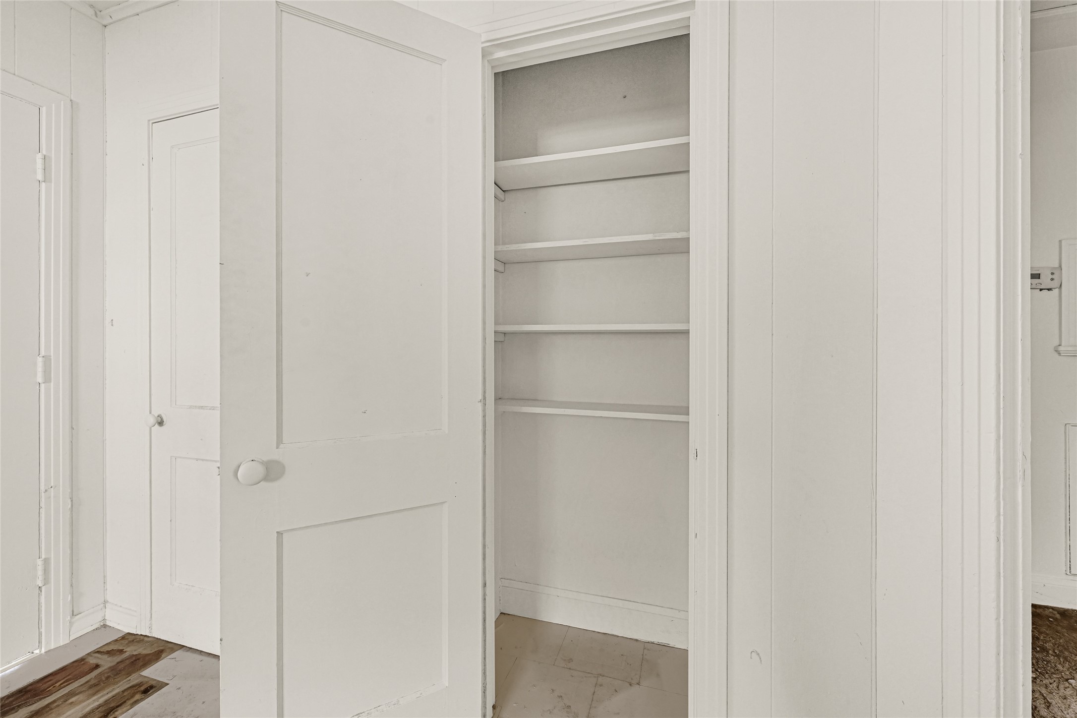 1202 North Roberson Street Conroe, TX 77301 - Photo 19 of 50 Closet/storage area with shelving