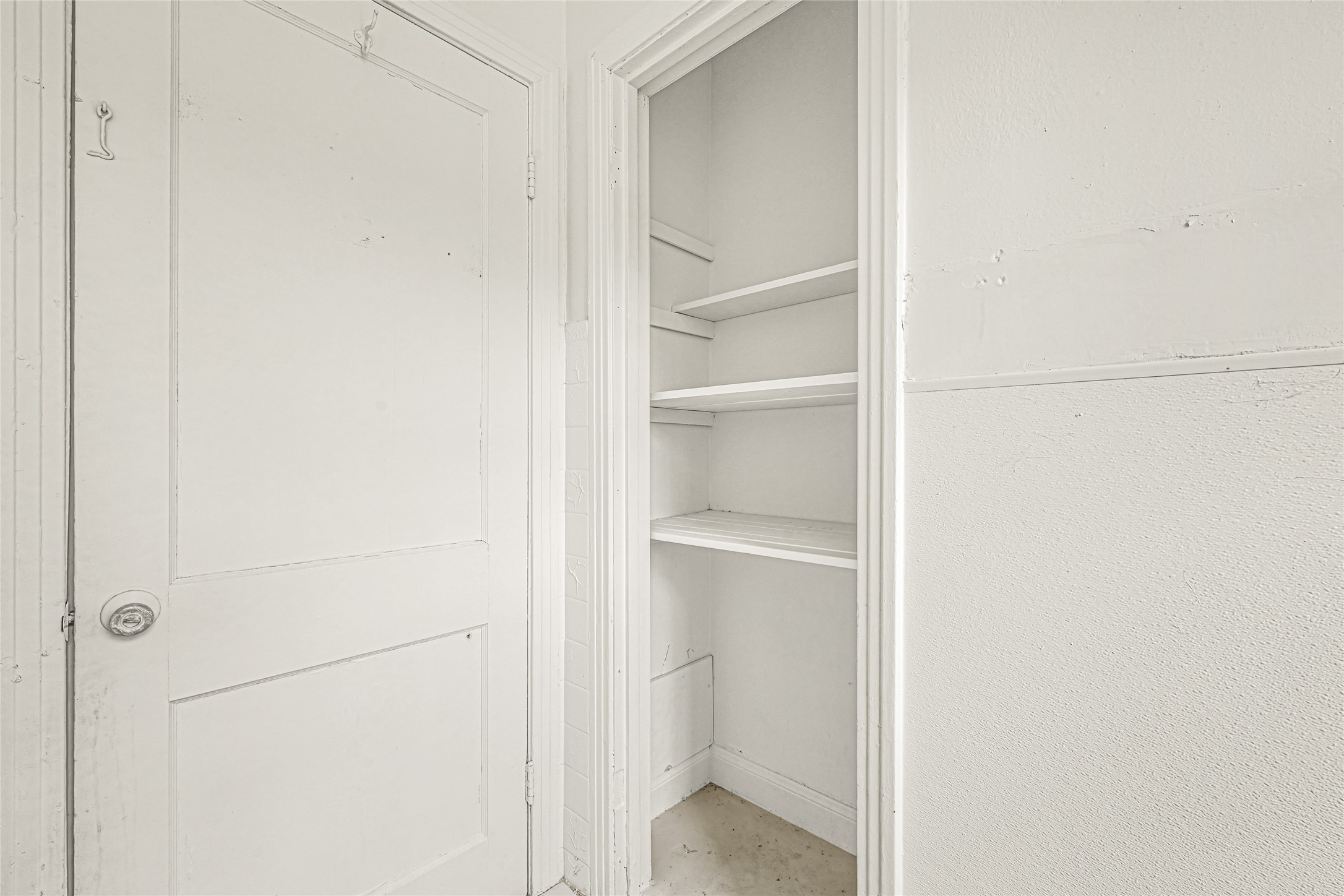1202 North Roberson Street Conroe, TX 77301 - Photo 27 of 50 Linen/storage closet with shelving