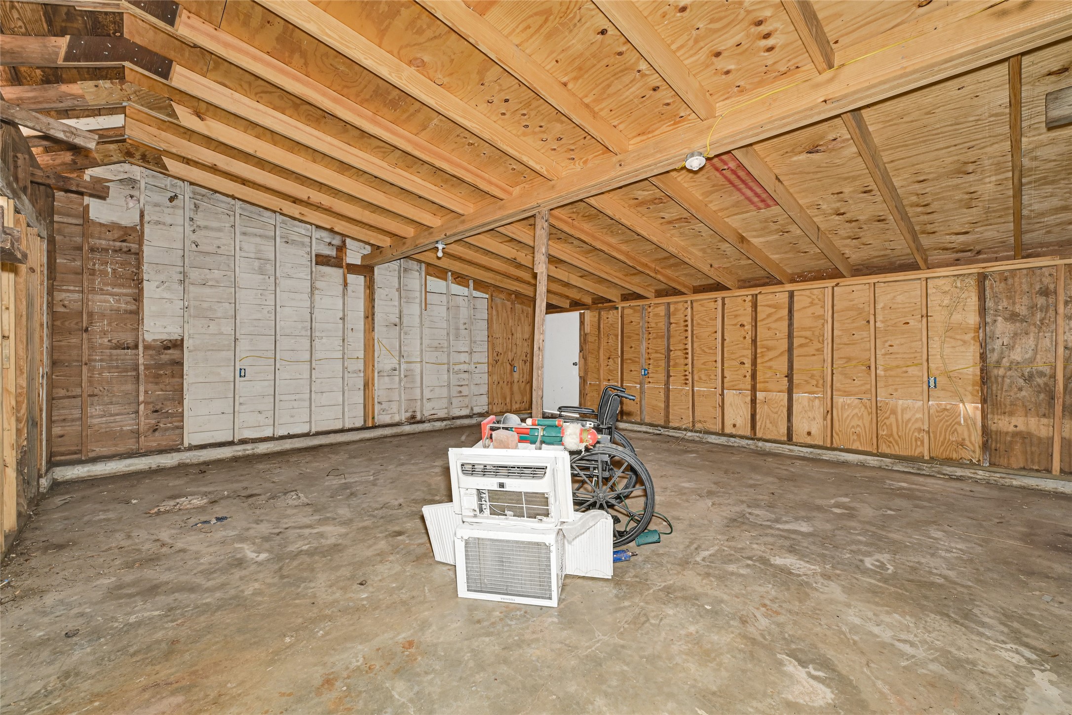 1202 North Roberson Street Conroe, TX 77301 - Photo 34 of 50 Attic/storage space