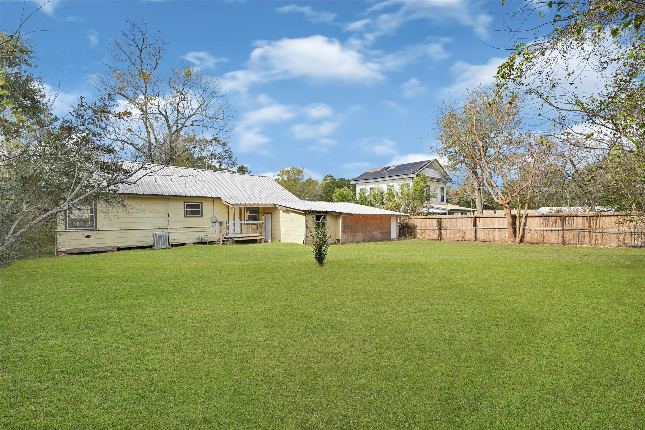 1202 North Roberson Street Conroe, TX 77301 - Photo 38 of 50 Backyard view toward rear of home