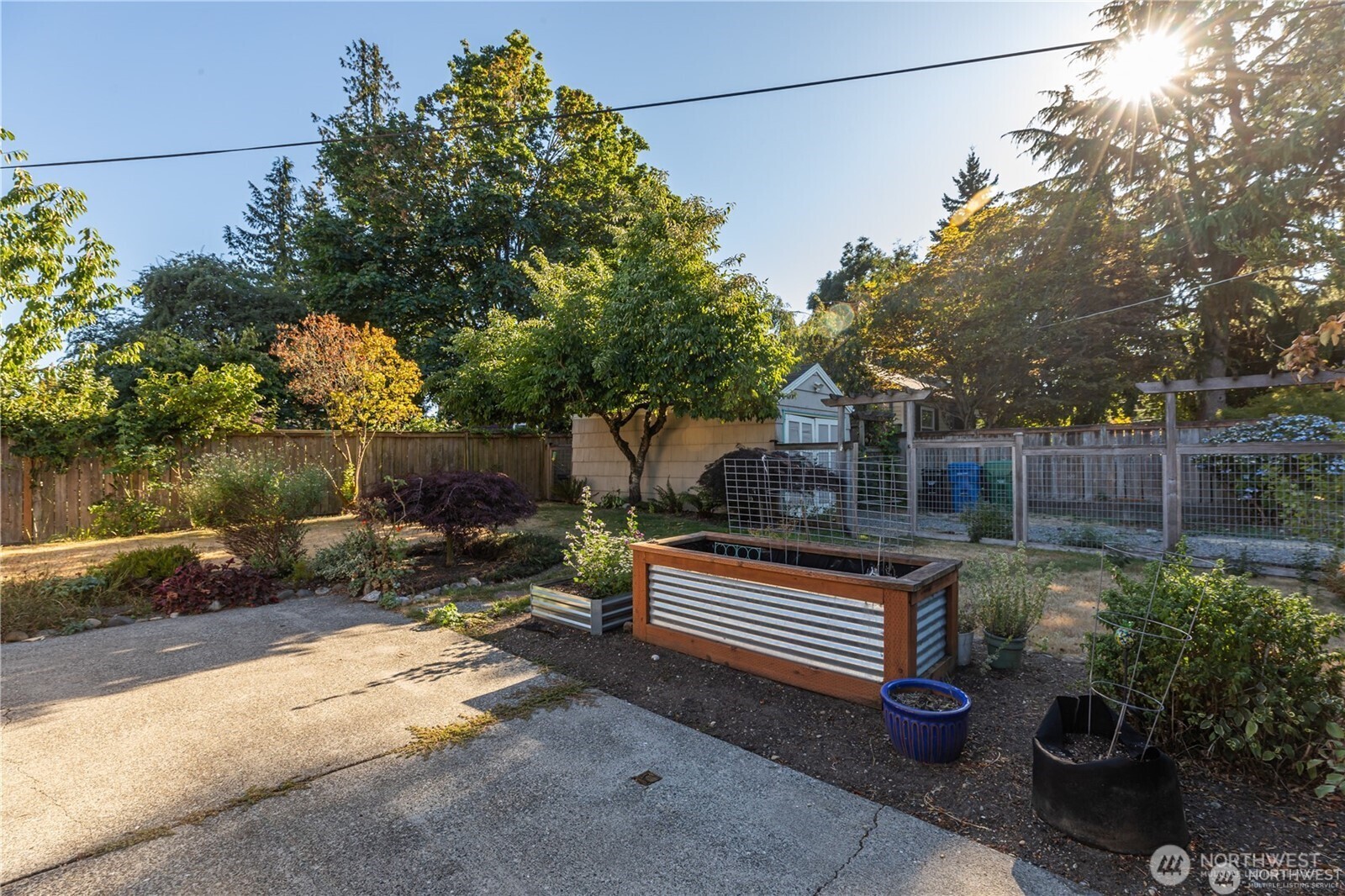 8601 36th Avenue Southwest Seattle, WA 98126 - Photo 25 of 28 a backyard of a house with seating space