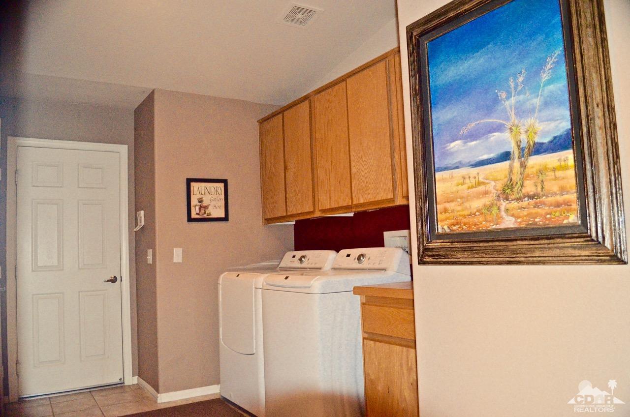 68115 Durango Road Cathedral City, CA 92234 - Photo 56 of 80 a utility room with dryer and washer