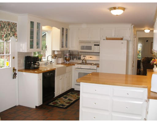38 Bay Colony Drive Ashland, MA 01721 - Photo 11 of 18 a kitchen with a refrigerator and a stove