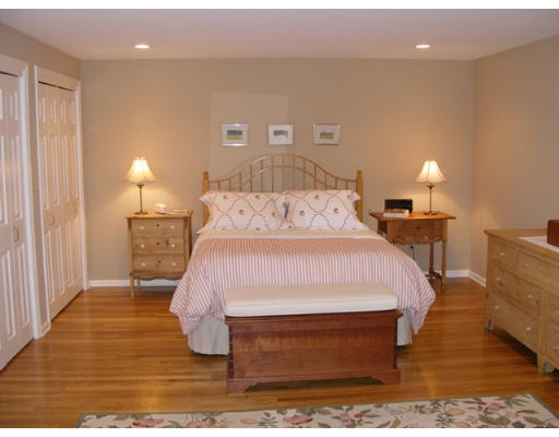 38 Bay Colony Drive Ashland, MA 01721 - Photo 12 of 18 a bed room with a bed window and lamp