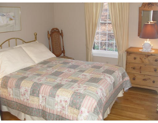 38 Bay Colony Drive Ashland, MA 01721 - Photo 15 of 18 a bedroom with a bed and a window