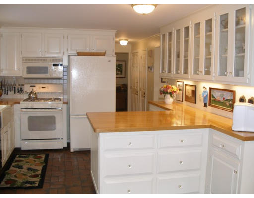 38 Bay Colony Drive Ashland, MA 01721 - Photo 10 of 18 a kitchen with granite countertop a sink a stove and refrigerator