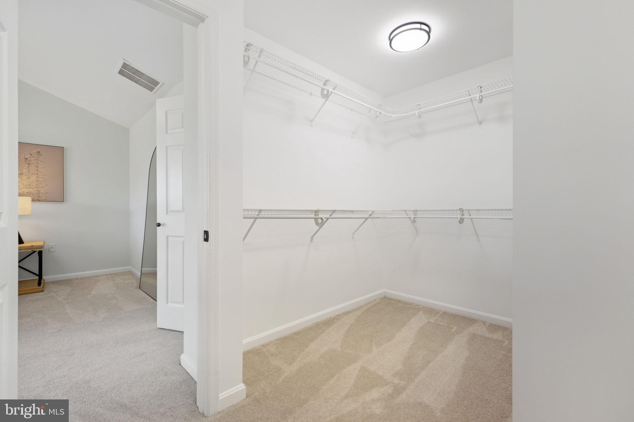 601 Springhouse Square Southeast Leesburg, VA 20175 - Photo 49 of 90 Primary walk-in closet continues