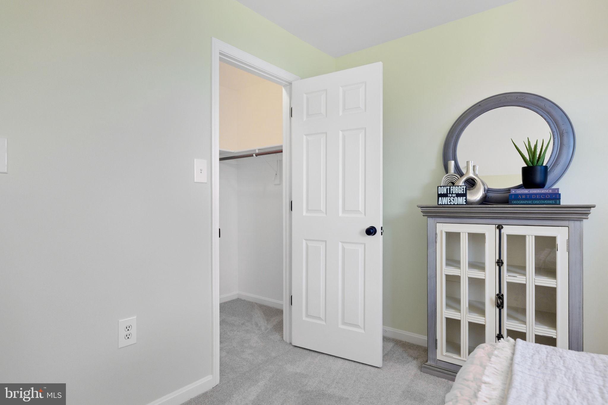 601 Springhouse Square Southeast Leesburg, VA 20175 - Photo 62 of 90 Front left bedroom walk in closet