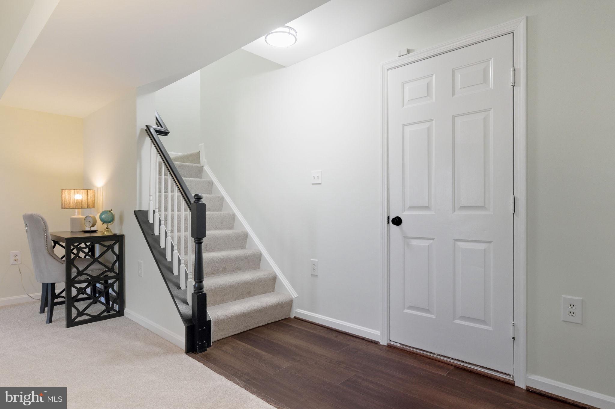 601 Springhouse Square Southeast Leesburg, VA 20175 - Photo 69 of 90 Garage entry with new LVP and new carpet