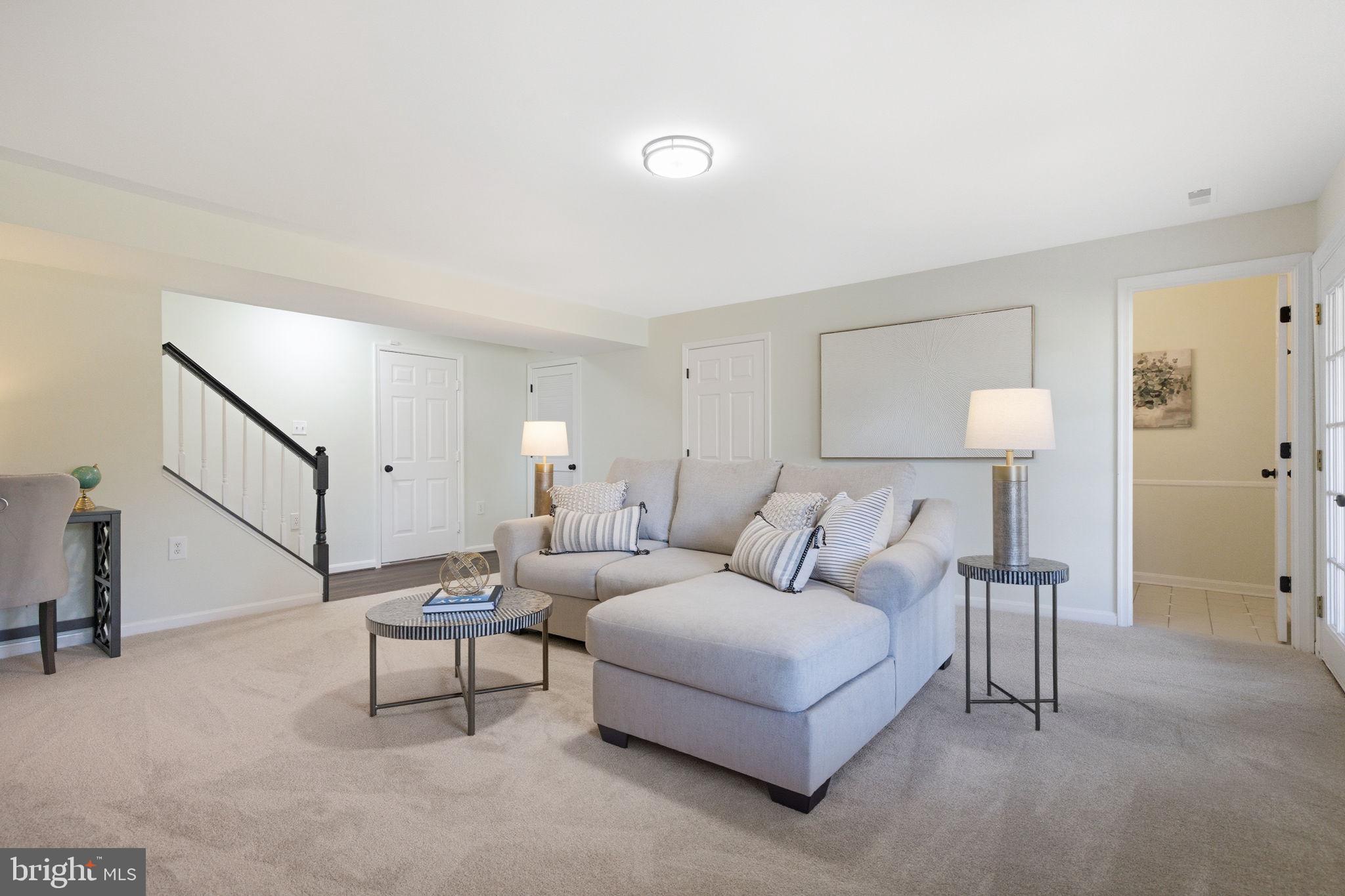 601 Springhouse Square Southeast Leesburg, VA 20175 - Photo 72 of 90 Garage access on the left, powder room to right