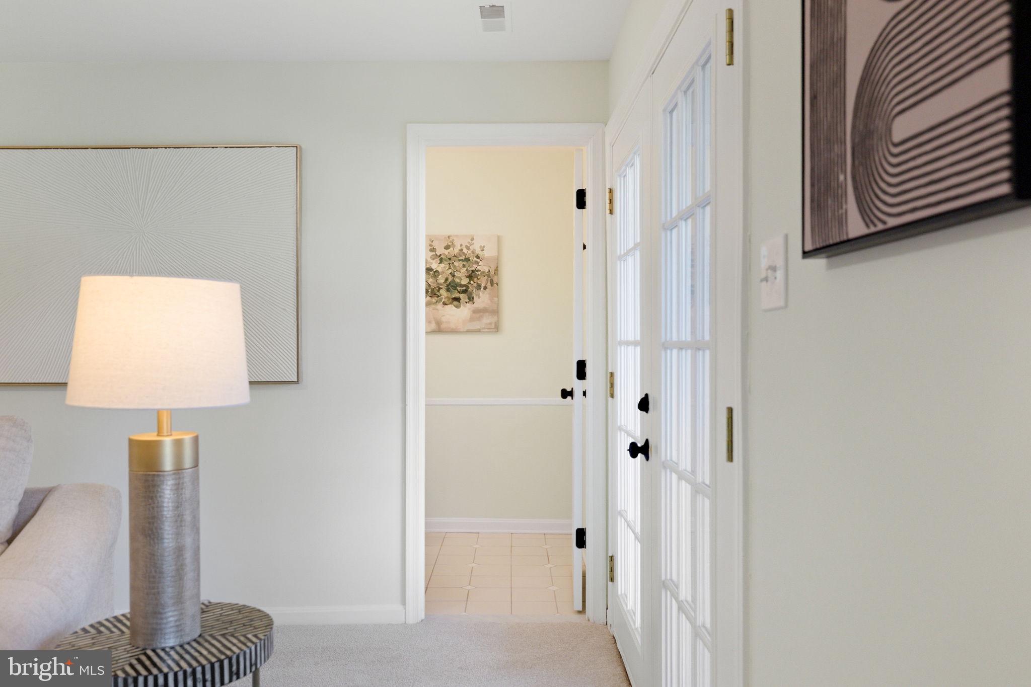 601 Springhouse Square Southeast Leesburg, VA 20175 - Photo 75 of 90 Lower level family room toward bathroom