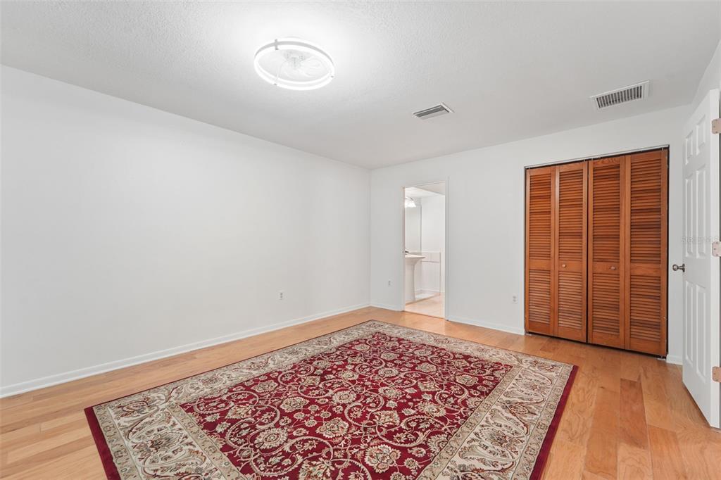 2007 Golf View Drive Dunedin, FL 34698 - Photo 16 of 39 an empty room with a rug