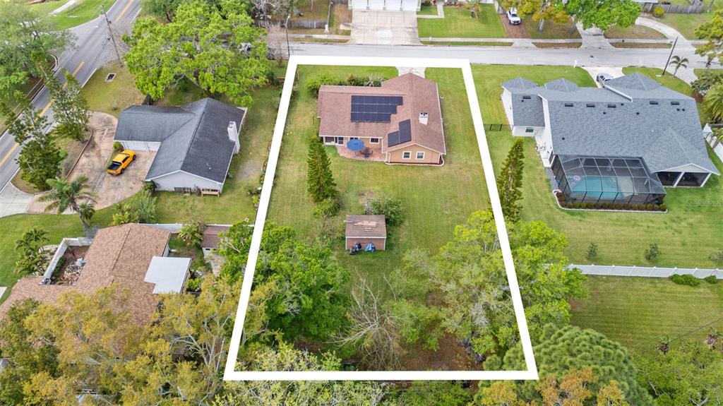 2007 Golf View Drive Dunedin, FL 34698 - Photo 37 of 39 an aerial view of residential houses with outdoor space and trees