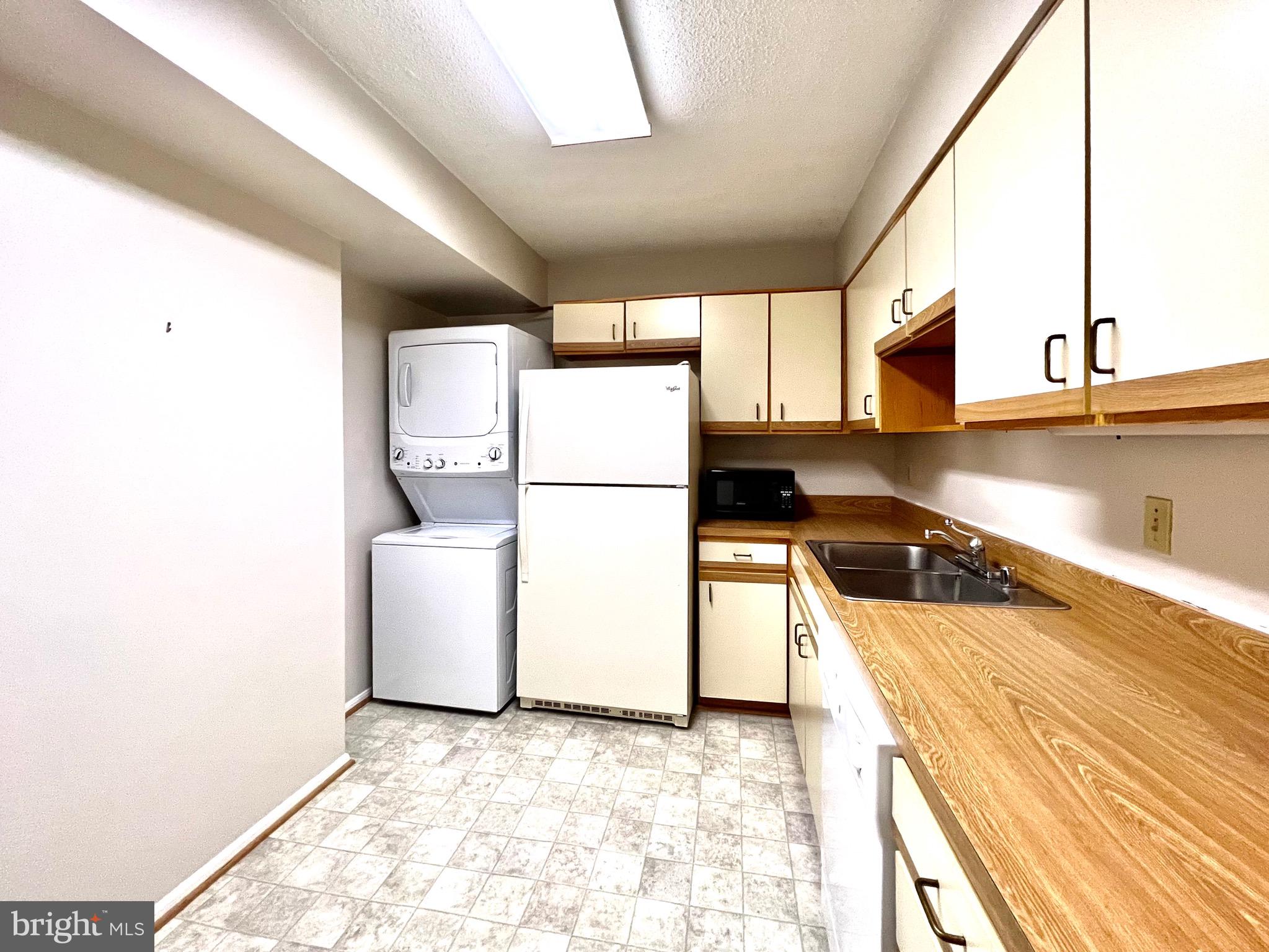 15115 Interlachen Drive, Unit 701 Silver Spring, MD 20906 - Photo 15 of 48 New flooring in the kitchen