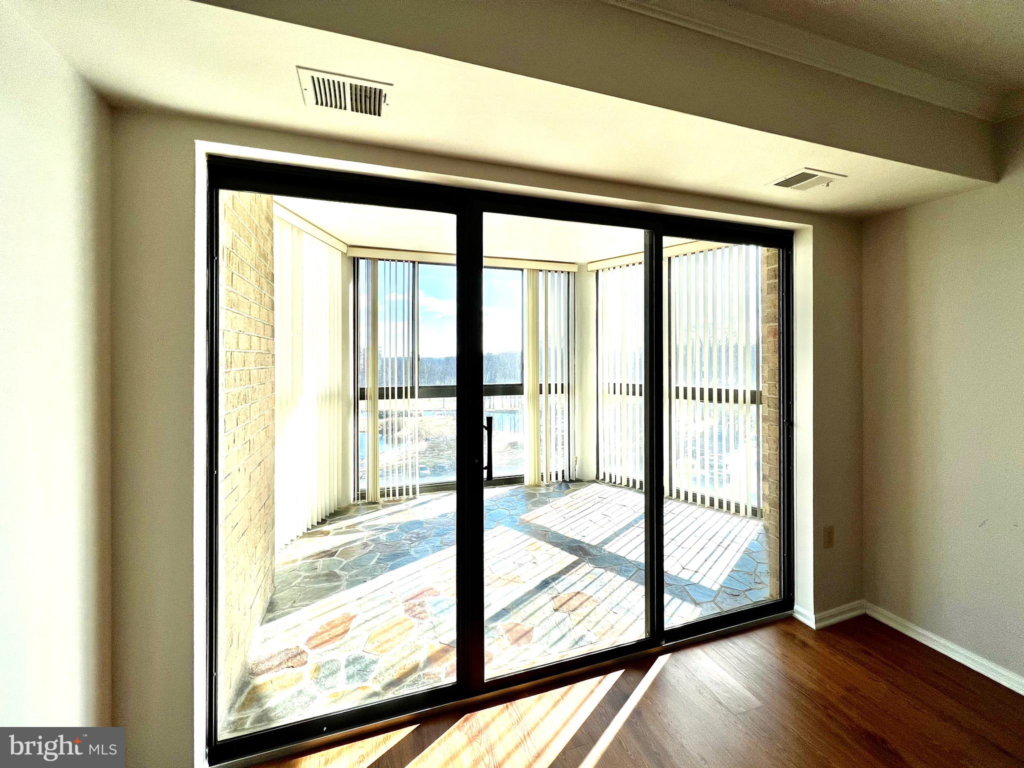 15115 Interlachen Drive, Unit 701 Silver Spring, MD 20906 - Photo 19 of 48 Sunroom of the living room