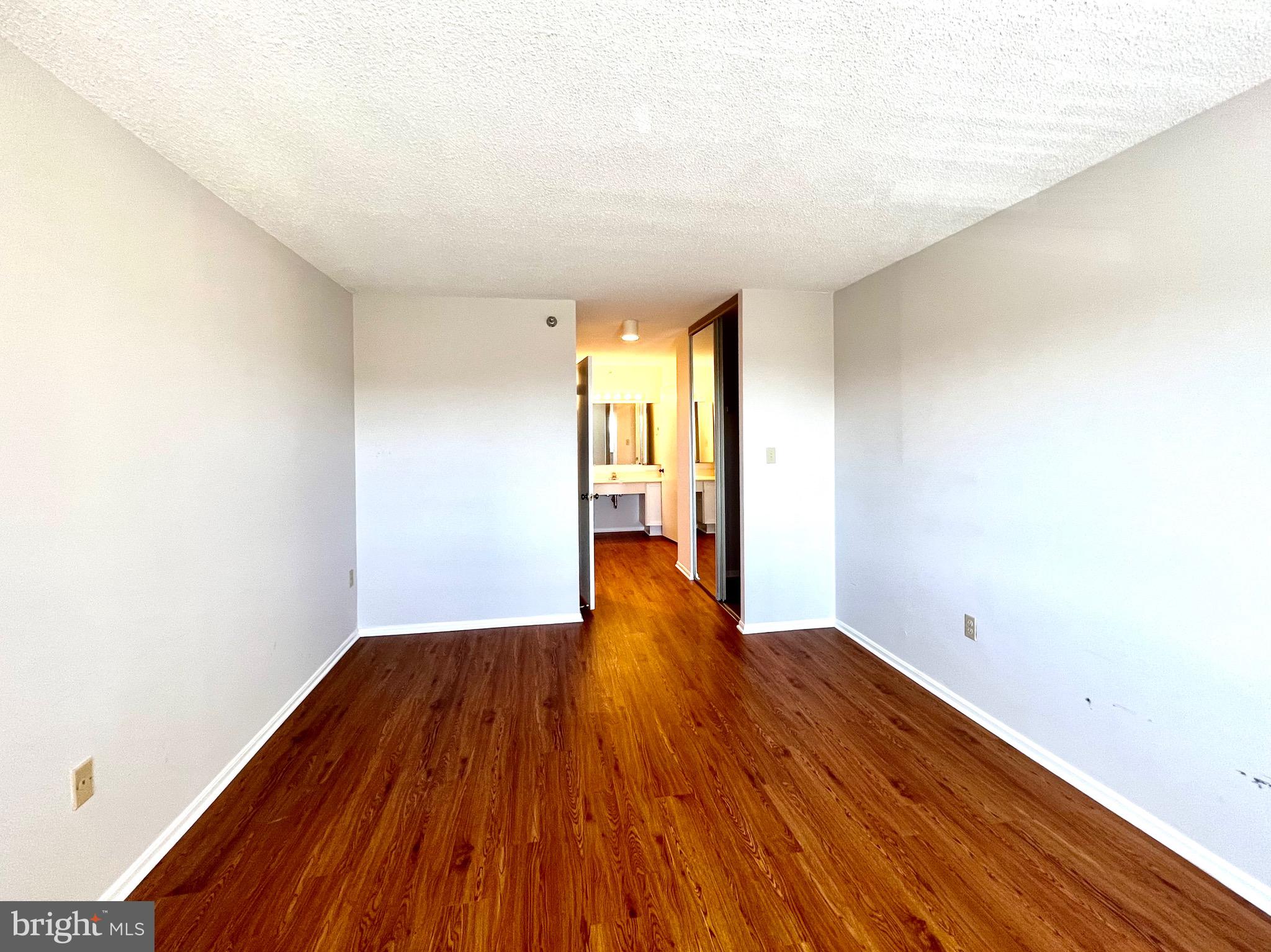15115 Interlachen Drive, Unit 701 Silver Spring, MD 20906 - Photo 27 of 48 Bedroom leading to dressing room