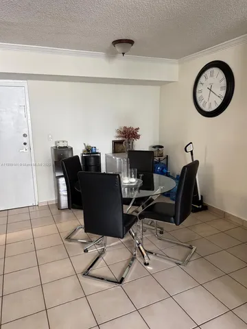 a view of a workspace with furniture