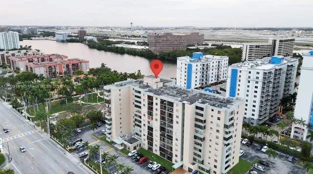 a view of city with ocean