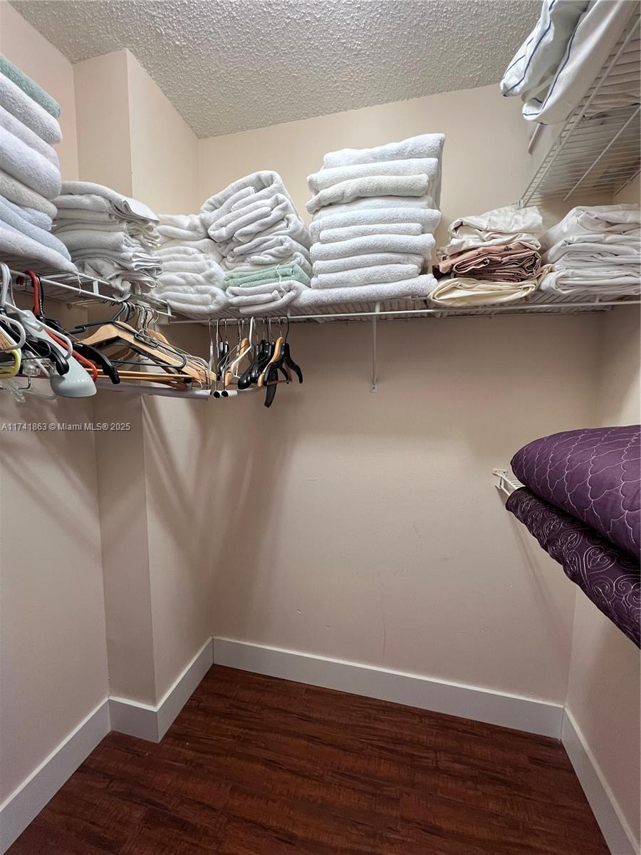 a view of a room with racks on the wall